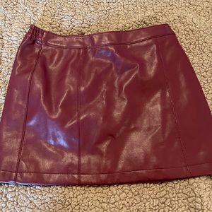 Leather like dark red skirt with zipper back